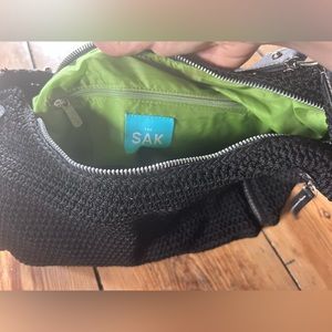 The Sak Black crochet hobo shoulder bag